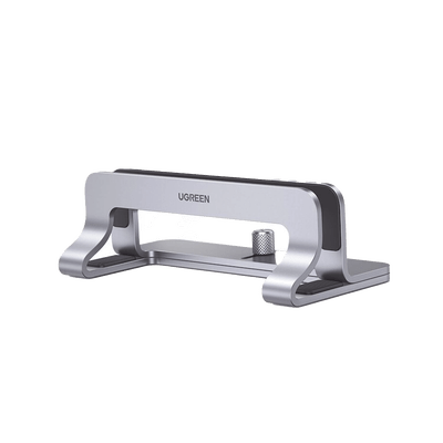 Soporte Vertical para Laptop / Adecuado para escritorio / Anchura Ajustable (12-26mm) / Amplia compatibilidad / Anti-Arañazos / Anti-Deslizante /Ajustable Mediante Tornillos / Color Plata / Aluminio + Silicona